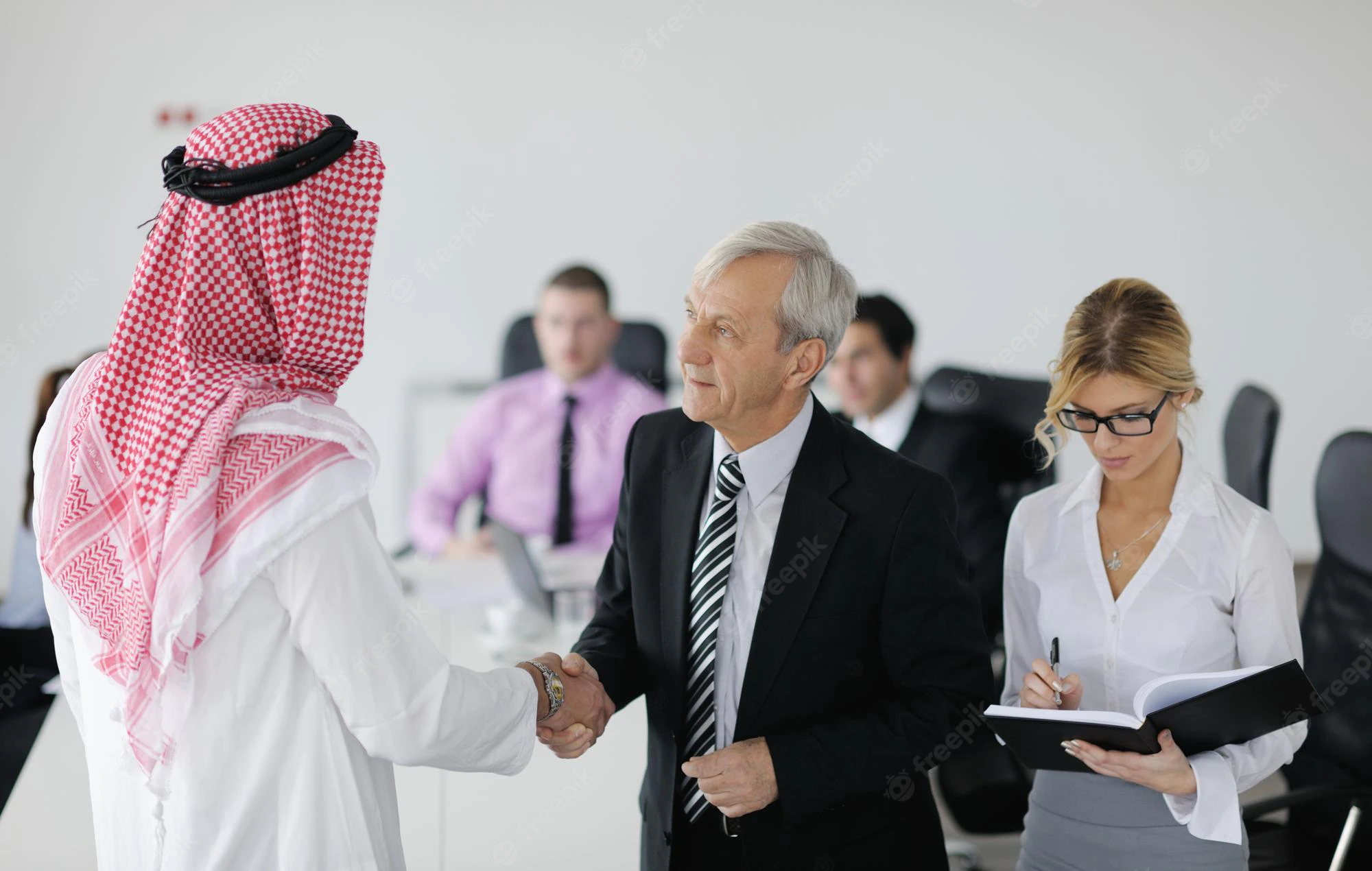 business meeting handsome young arabic man presenting his ideas colleagues listening ideas success investments bright modern office room 530697 20609